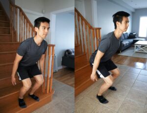 man performing a box jump from the bottom stair to the floor