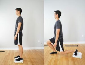 man performing a lunge exercise with rear foot on a towel