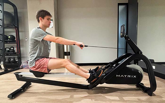 man-demonstrating-proper-rowing-technique-5